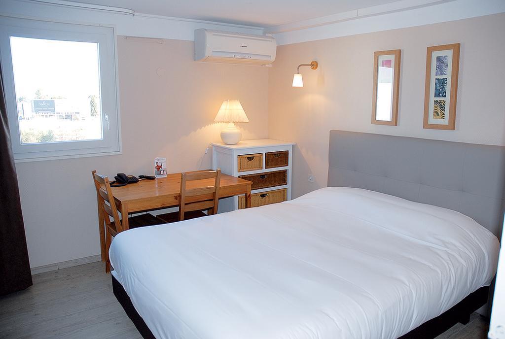 Contact Hotel Le Sud Montpellier Aeroport Parc Expo Arena Моґійо Екстер'єр фото